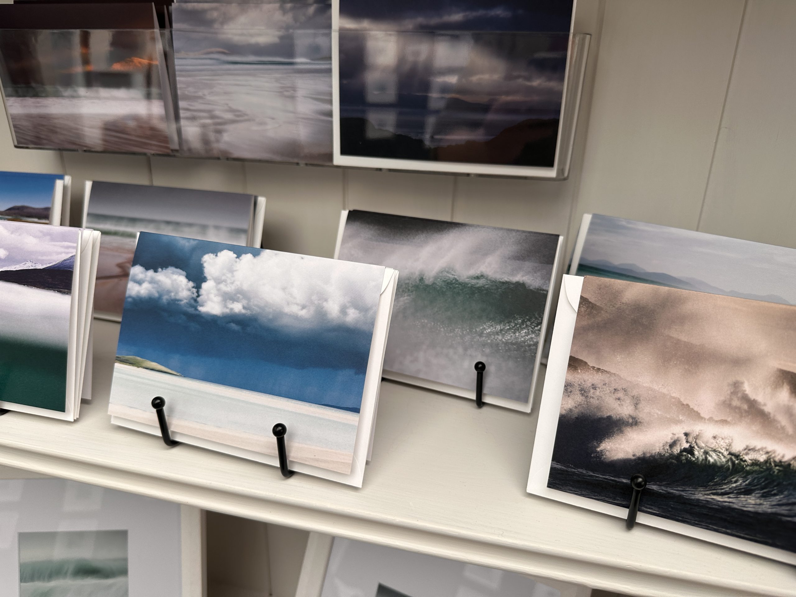 Postcards in the art gallery on the Isle of Harris, Geocrab showing local scenes of the Outer Hebrides 