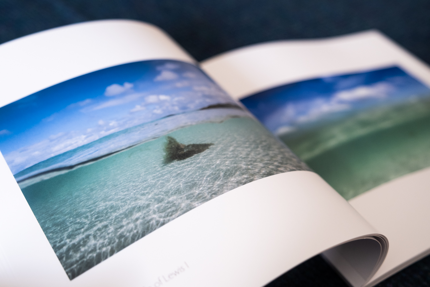 Open spread of Within Hebridean Seas showing an underwater photograph of the clear turquoise waters of the Outer Hebrides