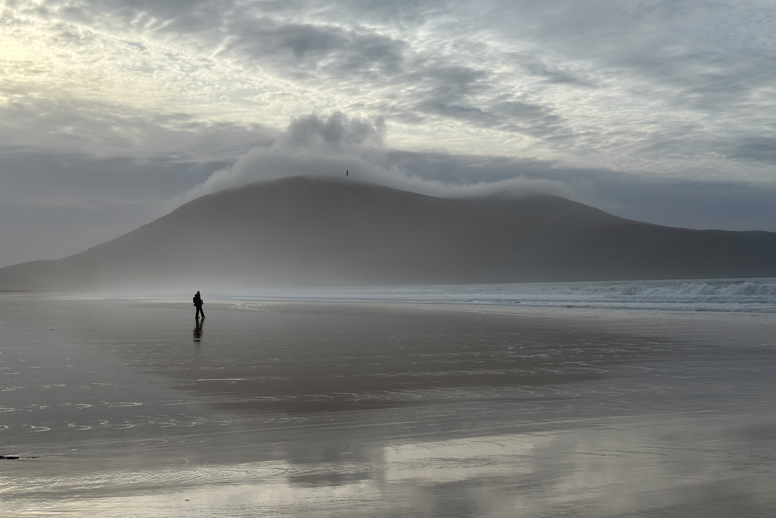 Margaret Soraya and her whippet Skye outside The Galerie, her photography gallery in the Bays of Harris, Isle of Harris