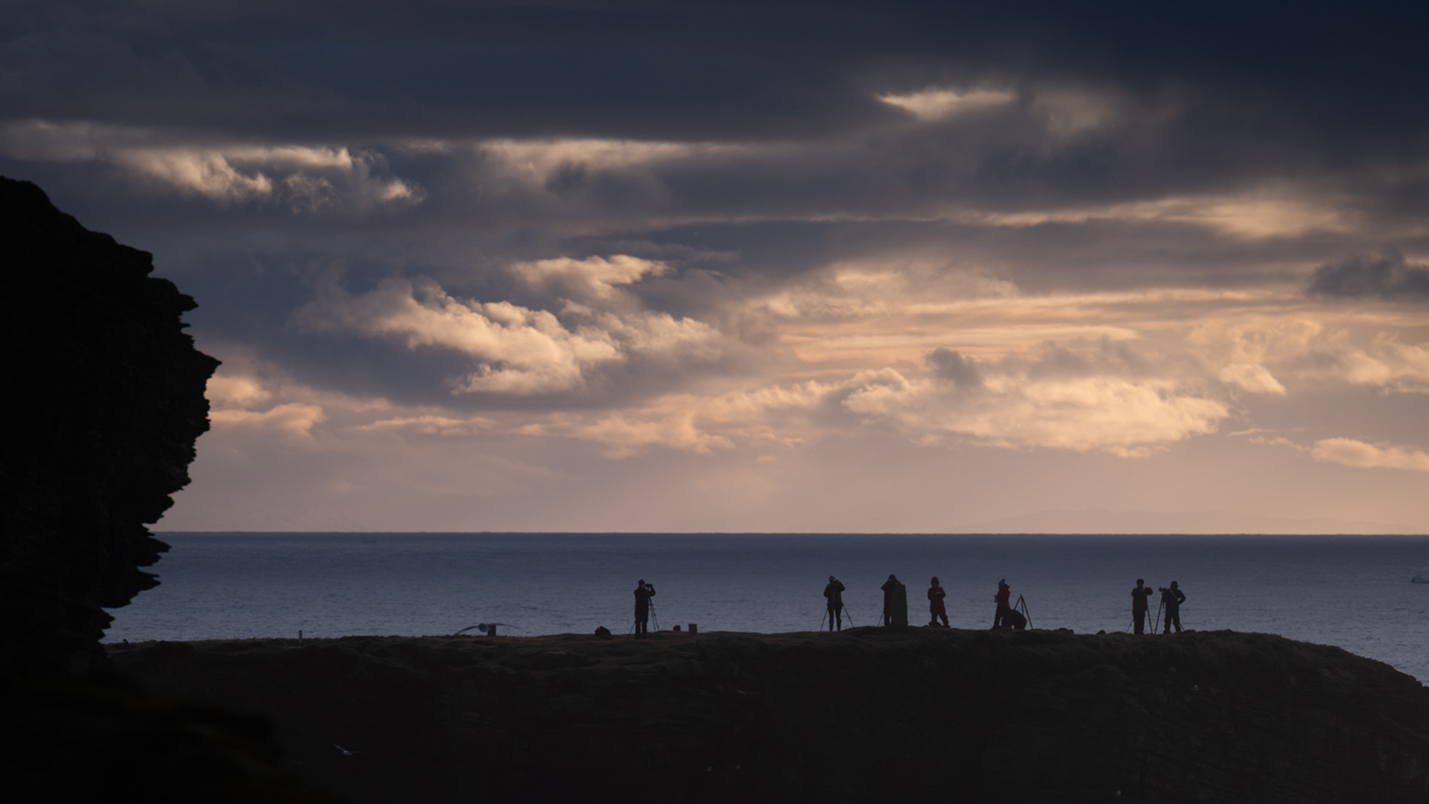 Photography workshop group silhouette cliffs