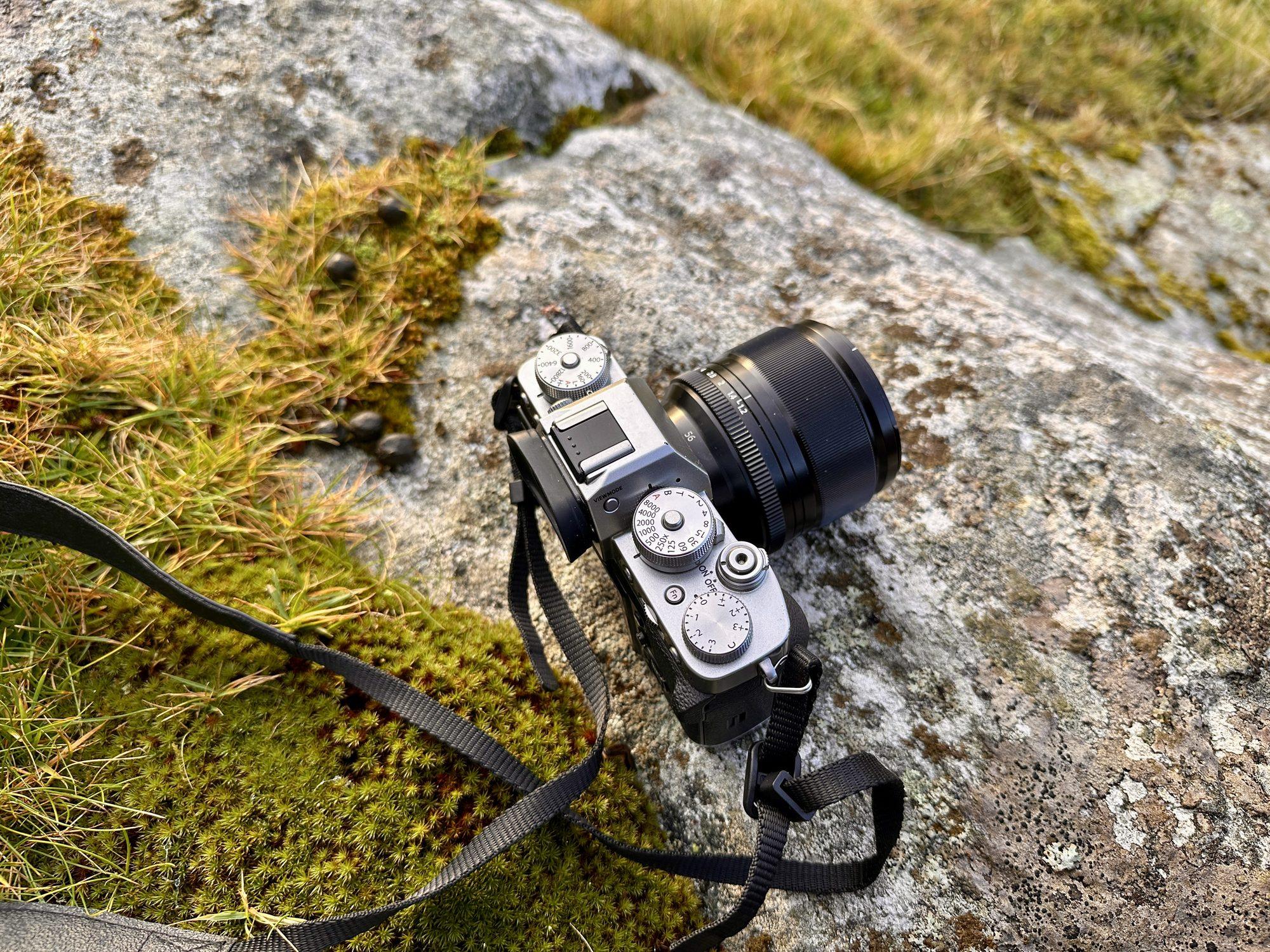 Fujifilm X-T3 with the Fujifilm 56mm f1.2 lens resting on a mossy rock on the Isle of Harris