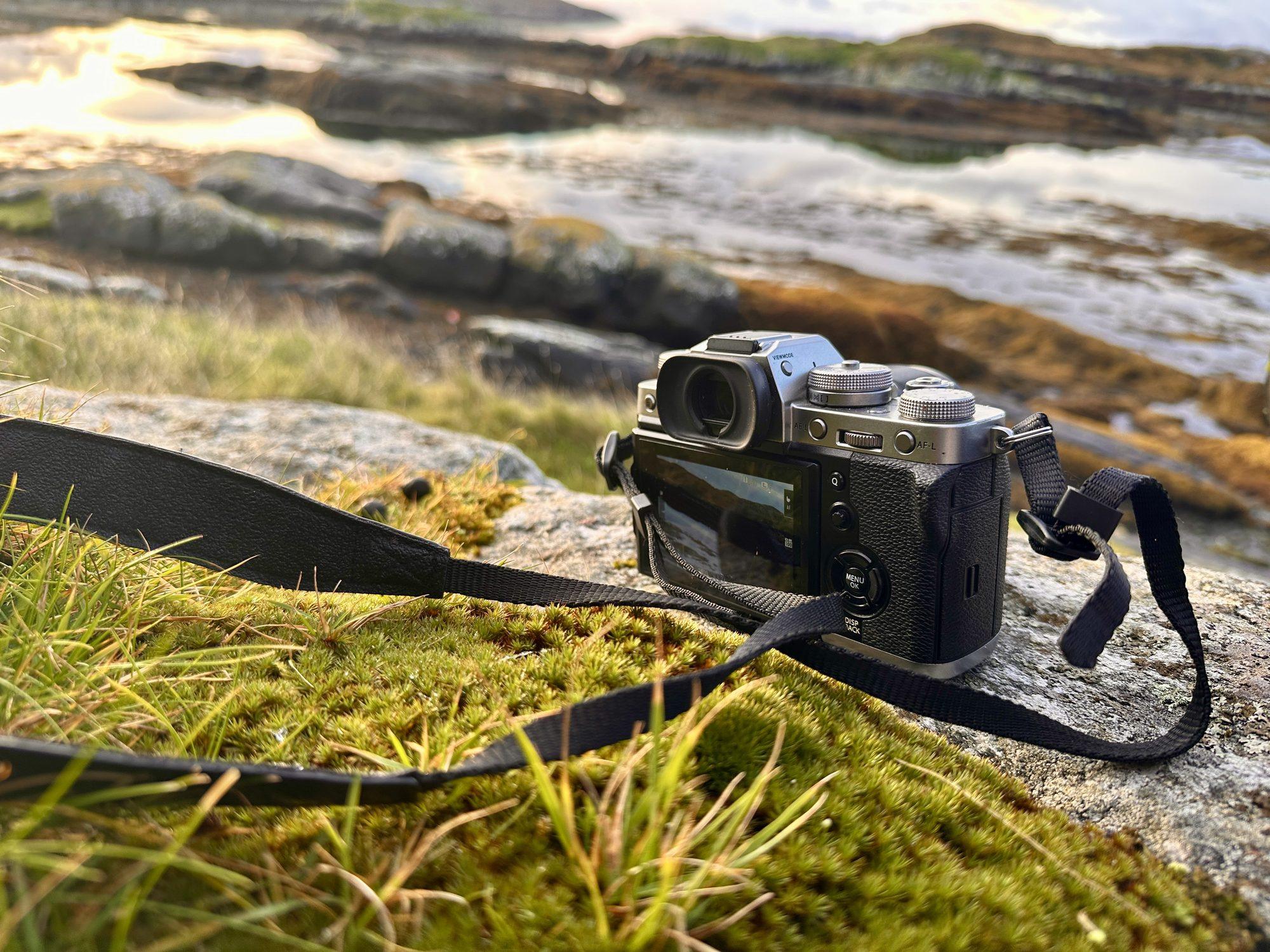 Fujifilm X-T3 camera on a rock by the shore at low tide in the Bays of Harris
